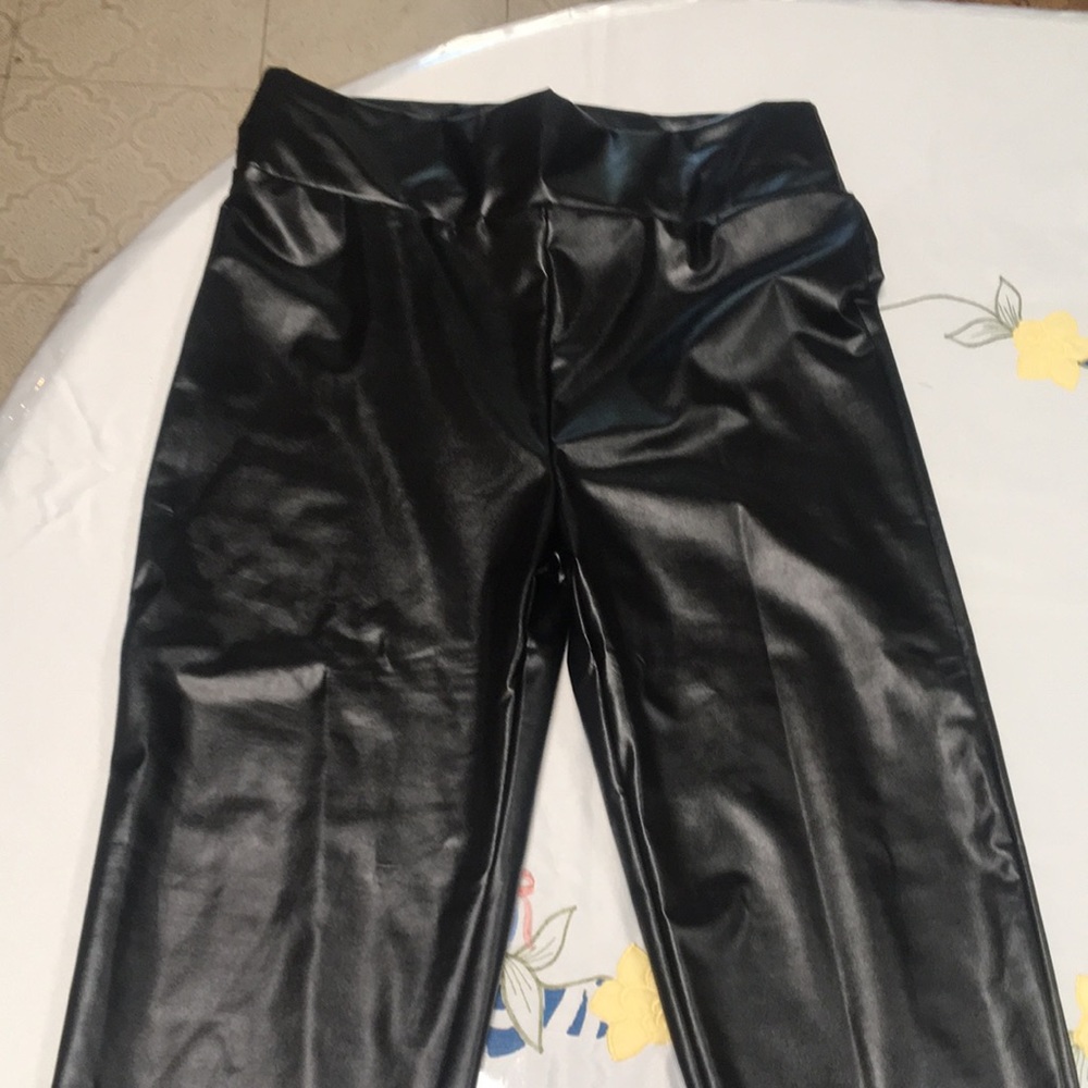 Never worn black leather leggings